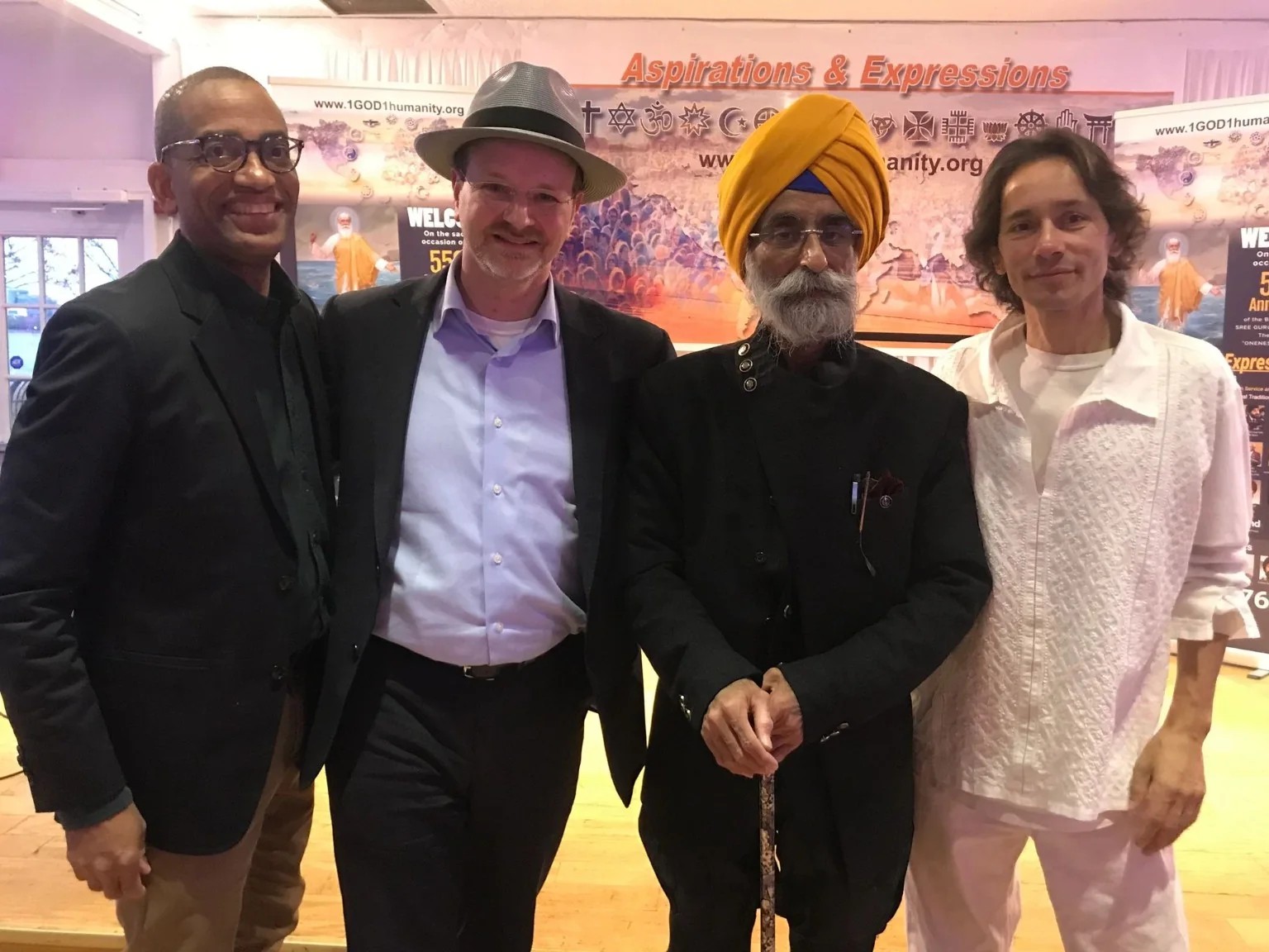 Jason Caplan with collaborators and interfaith leaders at a public gathering in New York.